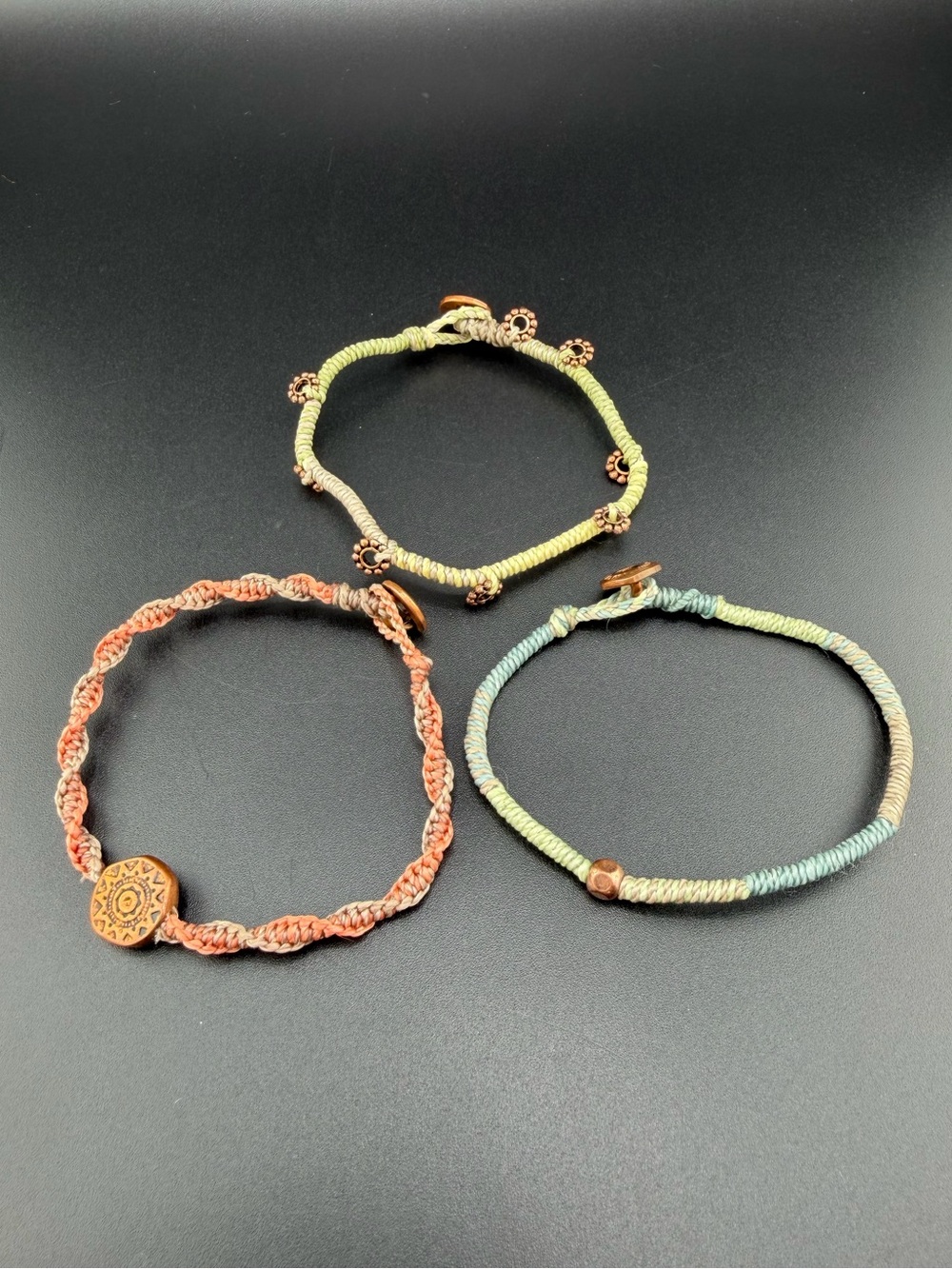 Wakami multi-colored macrame bracelets with wooden beads and charms Lot